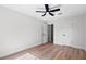 Bright bedroom with wood floors, ceiling fan and closet space at 1121 Northern Way, Winter Springs, FL 32708