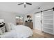Inviting bedroom with a comfortable bed, stylish dresser, and ensuite bathroom access at 1121 Northern Way, Winter Springs, FL 32708
