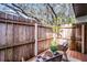 Private deck features outdoor seating, offering a cozy and secluded space at 1121 Northern Way, Winter Springs, FL 32708