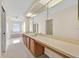 Large bathroom featuring a shower, bathtub, and a window for natural light at 14425 Huntingfield Dr, Orlando, FL 32824