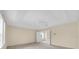 Bedroom featuring carpet, neutral walls, a ceiling fan, and access to another room at 14425 Huntingfield Dr, Orlando, FL 32824