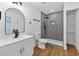 Beautiful bathroom featuring a glass shower, modern fixtures, and sleek vanity at 1503 Granite State Ct, Mount Dora, FL 32757