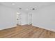 Spacious bedroom features luxury vinyl plank flooring and neutral walls at 1503 Granite State Ct, Mount Dora, FL 32757