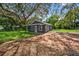 Charming single-story home featuring a brick driveway, well-maintained lawn, and mature trees at 1503 Granite State Ct, Mount Dora, FL 32757