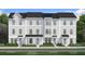Charming townhomes with varied gray exteriors, featuring optional extended porches and manicured landscaping at 15052 Grove Lake Dr, Winter Garden, FL 34787