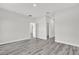 Bright bedroom featuring wood-look flooring with doors into closets at 15684 Sw 37Th Cir, Ocala, FL 34473
