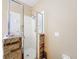 Close-up of a tiled shower with glass door and rock features at 1602 Presidio Dr, Clermont, FL 34711