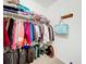Walk-in closet with ample storage, shelving, hanging space, and luggage storage at 1602 Presidio Dr, Clermont, FL 34711
