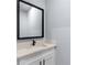 Bathroom featuring a sleek vanity, modern fixtures, and a large mirror at 1765 9Th Ave, Deland, FL 32724