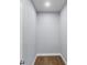 Walk-in closet featuring white walls and baseboards, wood floors and recessed lighting at 1765 9Th Ave, Deland, FL 32724
