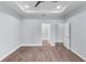 This main bedroom is spacious with tray ceilings and includes en suite bathroom entrance at 1765 9Th Ave, Deland, FL 32724
