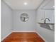 A dining area with hardwood floors and a kitchen pass-through at 2035 Dixie Belle Dr # 2035C, Orlando, FL 32812