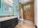 Updated bathroom with a modern vanity and tiled shower at 2342 Northumbria Dr, Sanford, FL 32771