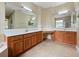 Double sink vanities create an elegant and functional bathroom space at 2342 Northumbria Dr, Sanford, FL 32771