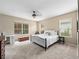 Bright bedroom features large windows and neutral decor at 2342 Northumbria Dr, Sanford, FL 32771