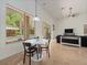 Breakfast nook with view of pool area through large window at 2342 Northumbria Dr, Sanford, FL 32771