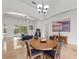 Dining area with a round table and view of the pool, perfect for entertaining at 2342 Northumbria Dr, Sanford, FL 32771