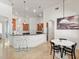Spacious kitchen with breakfast bar seating and adjacent dining area at 2342 Northumbria Dr, Sanford, FL 32771