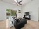 Comfortable living area with a view of the pool through sliding glass doors at 2342 Northumbria Dr, Sanford, FL 32771