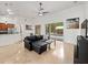 Open-concept living space with kitchen and breakfast nook overlooking the pool at 2342 Northumbria Dr, Sanford, FL 32771