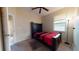 Comfortable bedroom featuring carpeted floors and a serene window view at 3552 Macauley Ct, Ocoee, FL 34761