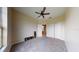 Bedroom with neutral carpet, ceiling fan, and large closet doors at 3552 Macauley Ct, Ocoee, FL 34761