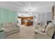 Inviting living area connected to the kitchen with comfortable seating for relaxation and entertaining at 3750 Oak Pointe Blvd, Kissimmee, FL 34746