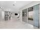 Open concept living space featuring tile floors, recessed lighting, and a seamless transition to outdoor patio at 4028 Southern Vista Loop, St Cloud, FL 34772