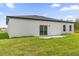The backyard patio and grass at 4662 Sw 136Th St, Ocala, FL 34473