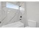 Modern bathroom with a luxurious soaking tub and stylish tiled walls at 4662 Sw 136Th St, Ocala, FL 34473