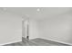 Open bedroom with gray flooring, neutral walls, and ample space for furnishings at 4662 Sw 136Th St, Ocala, FL 34473