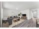 Inviting living room with contemporary furniture, sleek flooring, and plenty of natural light at 5120 Gopher Apple Dr, Apopka, FL 32712