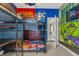 Fun themed bedroom with a bunk bed and murals of comic book heroes on the wall at 7416 Soiree Way, Reunion, FL 34747