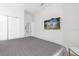 Relaxing bedroom with large bed and TV, perfect for unwinding after a long day at 7416 Soiree Way, Reunion, FL 34747