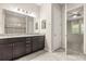 Bathroom features granite counters, dark wood cabinets, and tiled floor at 1046 Grand Hilltop Dr, Apopka, FL 32703