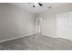 Neutral bedroom with a ceiling fan, light gray walls, and a tiled floor at 1046 Grand Hilltop Dr, Apopka, FL 32703