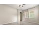 Neutral bedroom with tile flooring, light gray walls, and natural light at 1046 Grand Hilltop Dr, Apopka, FL 32703