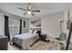 Bedroom featuring a ceiling fan and a large window with views at 1108 Summer Lakes Dr, Orlando, FL 32835