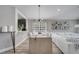 Dining room flows into the living room, complete with views of the kitchen at 1108 Summer Lakes Dr, Orlando, FL 32835