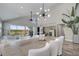 Dining room with a long table and seating, and access to the back patio at 1108 Summer Lakes Dr, Orlando, FL 32835