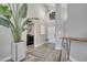 Bright entryway boasts high ceilings, modern lighting, and a convenient laundry area at 1108 Summer Lakes Dr, Orlando, FL 32835