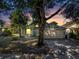 Charming home with attached garage, well-maintained landscaping, and inviting curb appeal at 1108 Summer Lakes Dr, Orlando, FL 32835