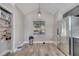 Kitchen with stainless steel refrigerator and plenty of room for a breakfast table at 1108 Summer Lakes Dr, Orlando, FL 32835