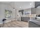 Well-lit kitchen features stainless steel appliances and ample counter space at 1108 Summer Lakes Dr, Orlando, FL 32835
