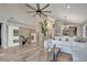 Bright living room with vaulted ceilings, tile flooring, and modern decor at 1108 Summer Lakes Dr, Orlando, FL 32835