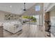 Open living room featuring high ceilings, tile floors, sliding glass doors and stylish decor at 1108 Summer Lakes Dr, Orlando, FL 32835