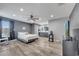 Spacious main bedroom with wood-look flooring and an ensuite bath with double sink vanity at 1108 Summer Lakes Dr, Orlando, FL 32835