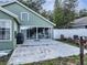 Spacious patio with outdoor seating, perfect for entertaining near sliding glass door at 1108 Summer Lakes Dr, Orlando, FL 32835