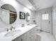 Spacious bathroom with double sinks, modern fixtures, and ample counter space at 1125 Almond Tree Cir, Orlando, FL 32835