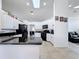 Bright kitchen featuring white cabinets, granite countertops, and stainless steel appliances at 1125 Almond Tree Cir, Orlando, FL 32835